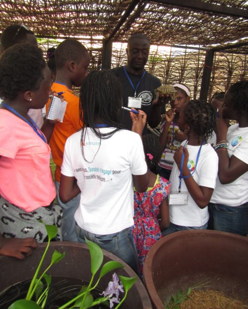 Tomas explaining tortoise ecology at the Rhodin center Senegal